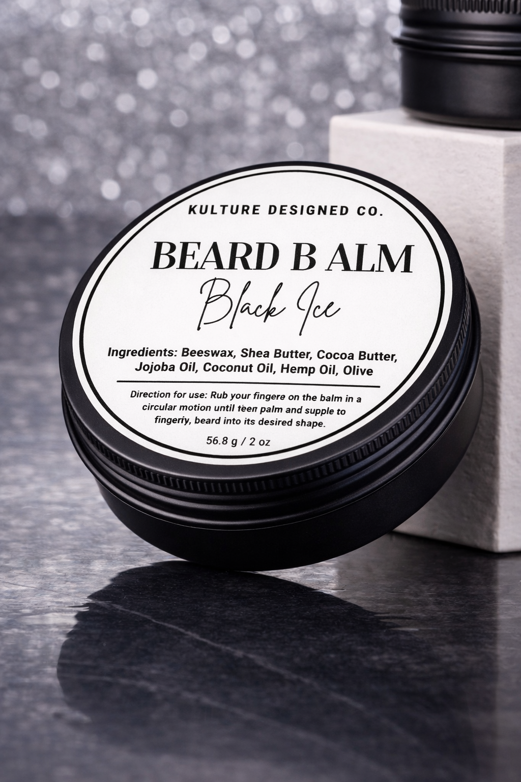 Beard balm container with label on a dark surface