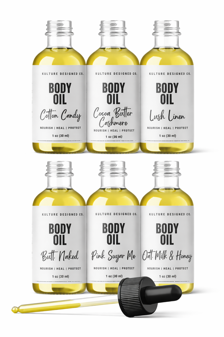 Set of six bottles of body oil with labels on a white background
