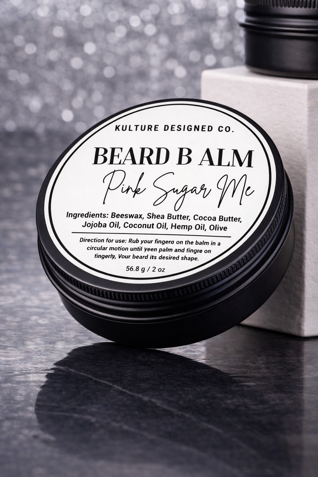 Beard balm container with label on a dark surface
