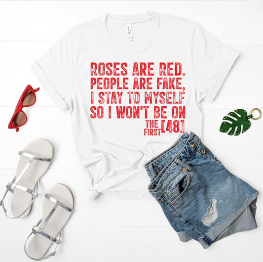 White t-shirt with red text, denim shorts, sandals, and sunglasses on a white background