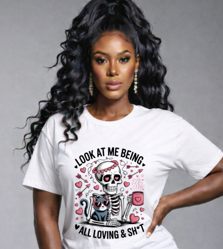 Woman wearing a white t-shirt with a graphic design and text.