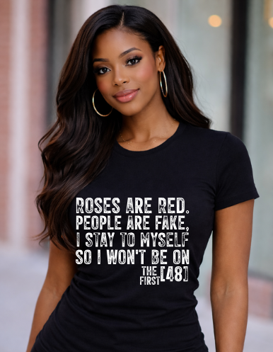 Woman wearing a black t-shirt with a humorous quote